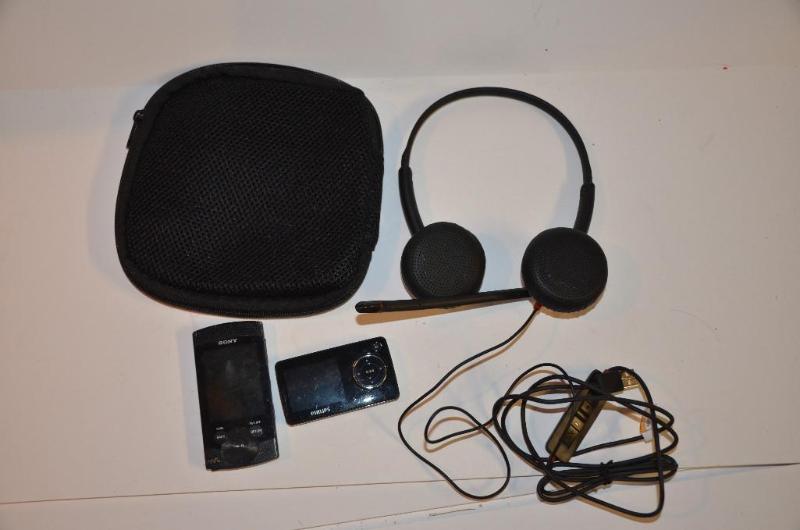 lot 14 image: Plantronics head phone, Philips Go Gear MP3 p...