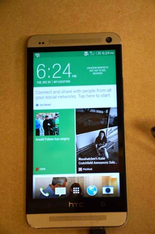 lot 26 image: T-Mobile HTC ONE cell phone Android, powers u...