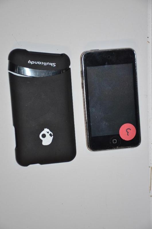 lot 3 image: Apple iPod Touch - 8GB, with Skullcandy case,...
