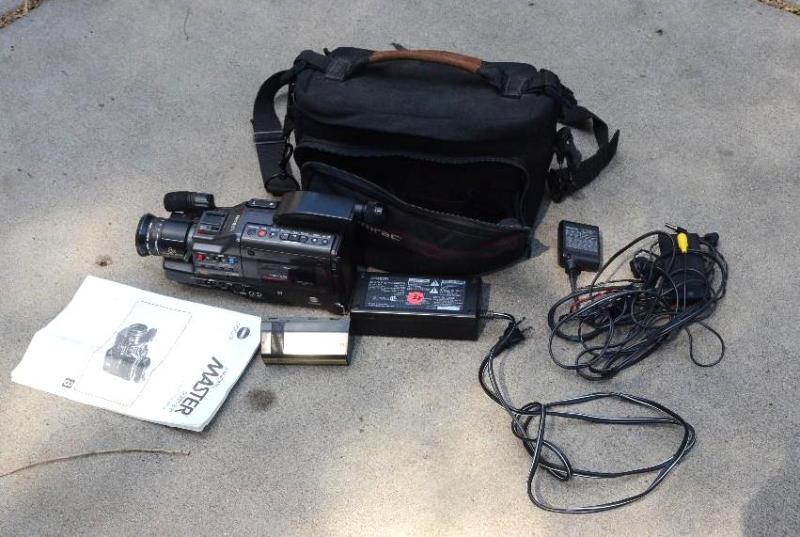 lot 38 image: Minolta video camera model 81 with case...