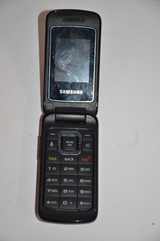 lot 42 image: Samsung flip phone, not tested, no power cord...