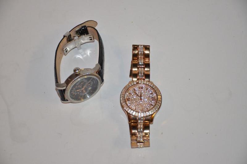 lot 64 image: Xanadu gold colored watch Stuhrling black wat...