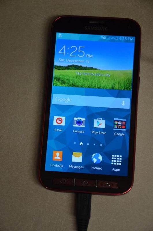 lot 73 image: SPRINT Samsung Galaxy S5 sport phone, powers ...