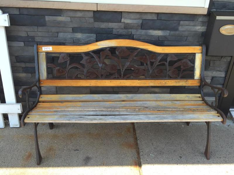 lot 144 image: Outdoor wood and cast iron bench. 15 x 29 x 4...