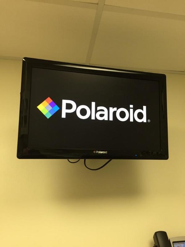 lot 26 image: Polaroid Dolby digital TVDVD player combo w...
