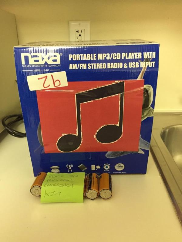 lot 92 image: NAXA Portable MP3CD player with AMFM stereo...