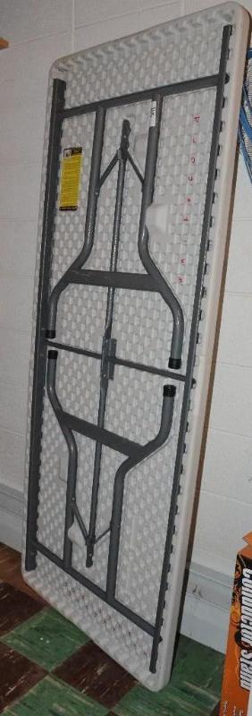 lot 115 image: White folding table 29x72...
