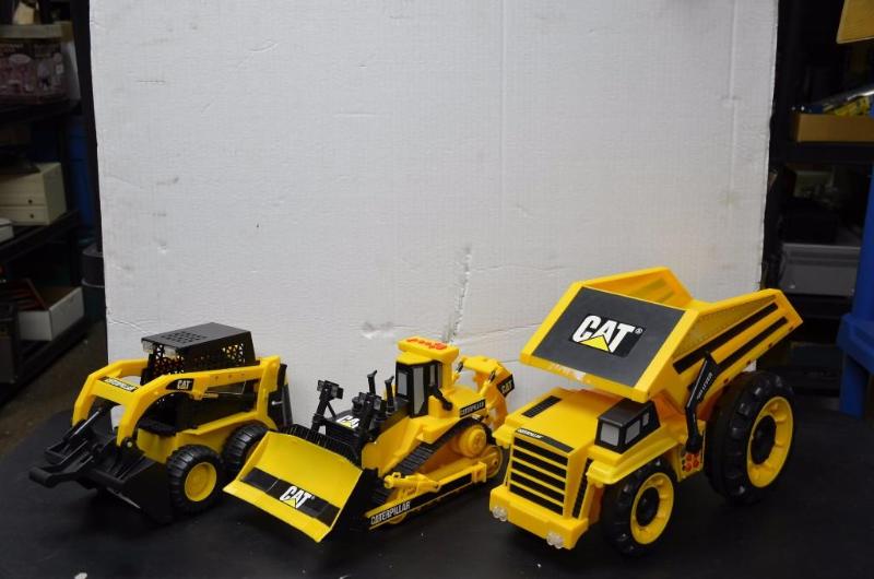 lot 50 image: Caterpillar toy trucks from toy state make so...