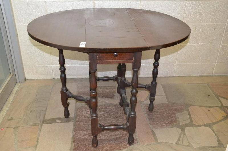 lot 96 image: Antique table with folding leaves. When folde...