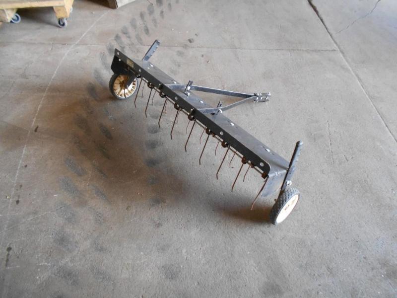 lot 8 image: Tow Behind Thatcher Rake Unit.
