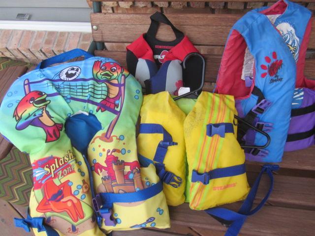 lot 310 image: Childs Ski  Wakeboard Vests