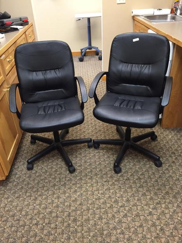 lot 176 image: 2 black rolling desk chairs...