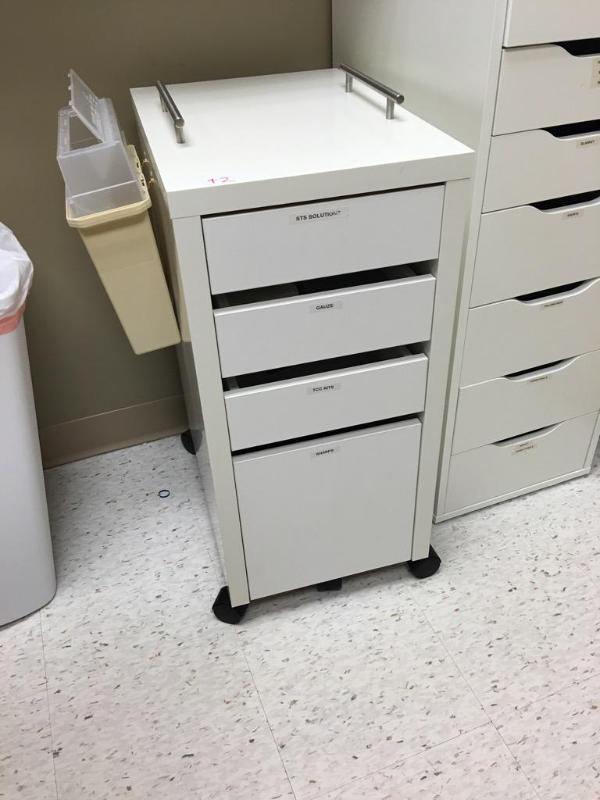 lot 42 image: White 4 drawer rolling cabinet (13 34&quotx...