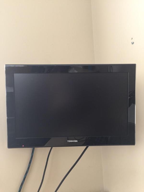lot 86 image: 18" wall mounted Toshiba Monitor with DV...