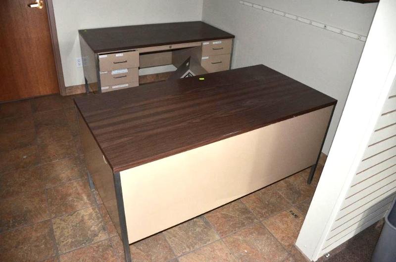 lot 120 image: Two metal desks 60x30". Bring help to re...