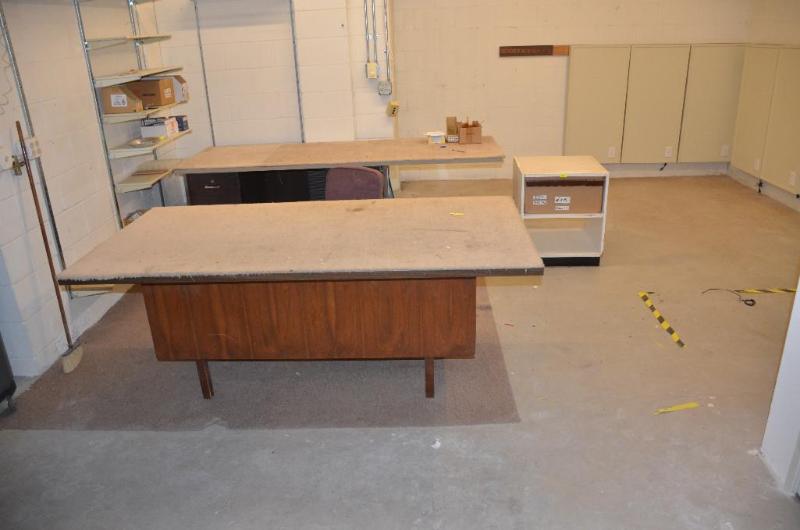 lot 127 image: Two desks with carpeted tops used as packagin...