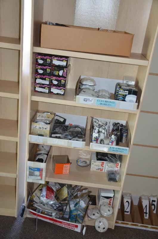 lot 99 image: Contents of shelves - motion sensors, light i...