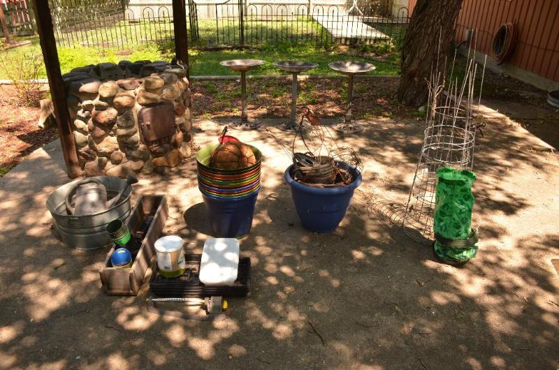 Garden seeds, pots, tomato cages as pictured....