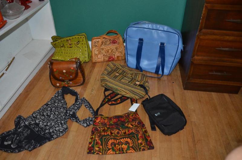 2 hand tooled leather pursues, and 6 other pu...
