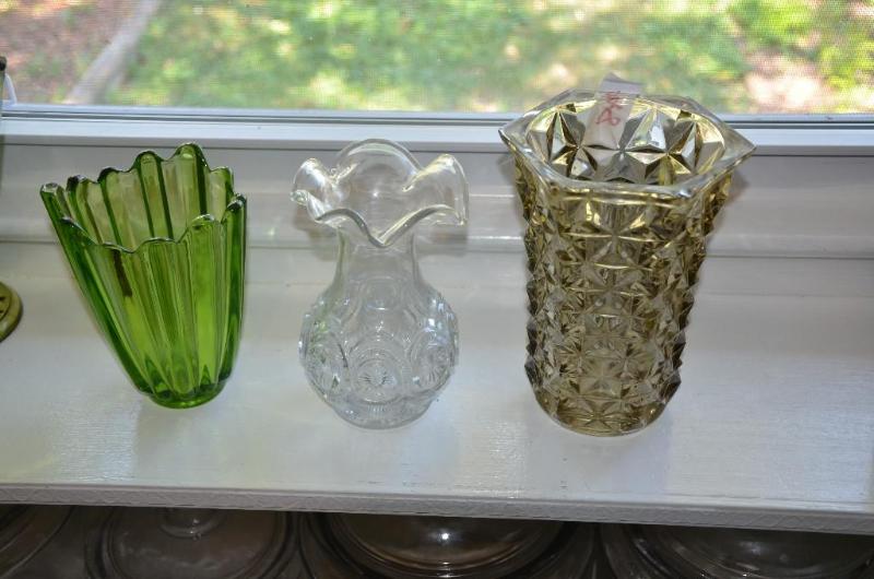 Two Green glass vases and one white glass vas...