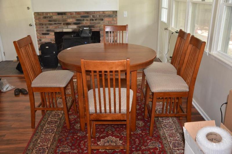 Wood round table 48&quot diameter, with one ...