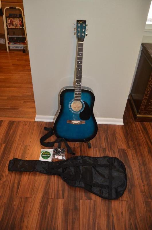 BC guitar with case and stings...
