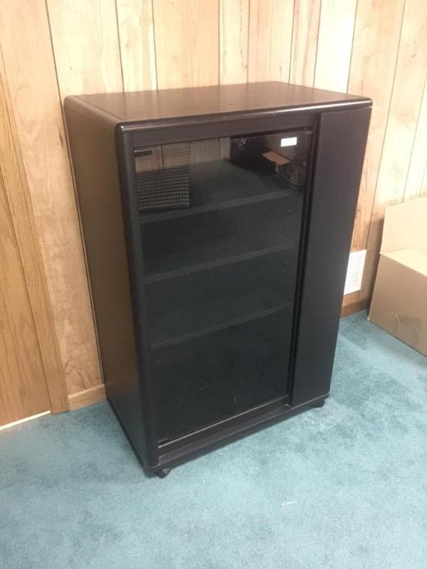 lot 62 image: Glass display rack 27x16x41" for DVDs.&n...