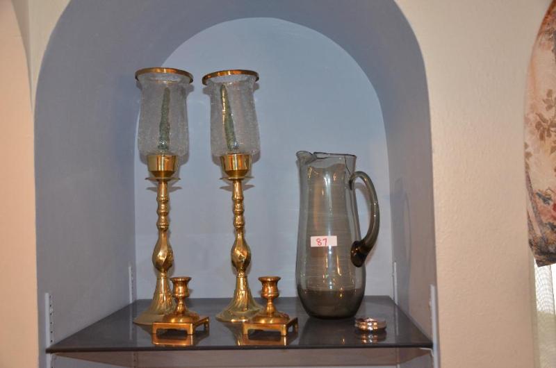 lot 87 image: Glass pitcher, metal candle sticks, tallest i...