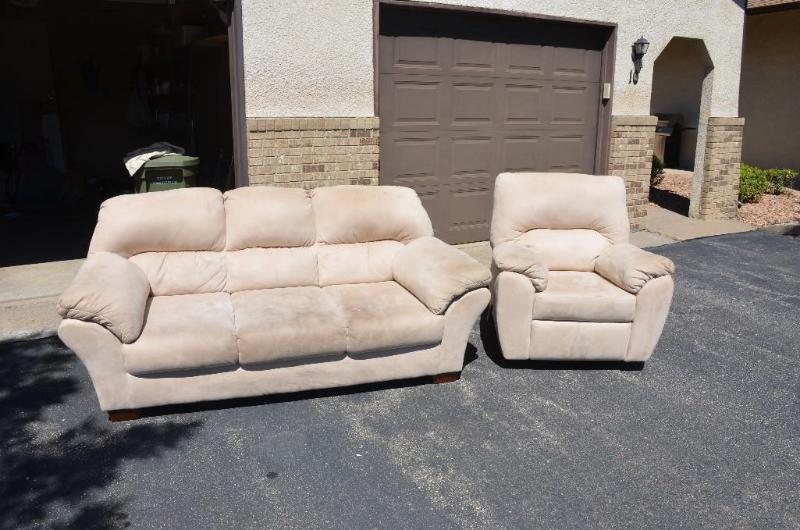 lot 93 image: Sofa and matching recliner. the sofa has a sp...