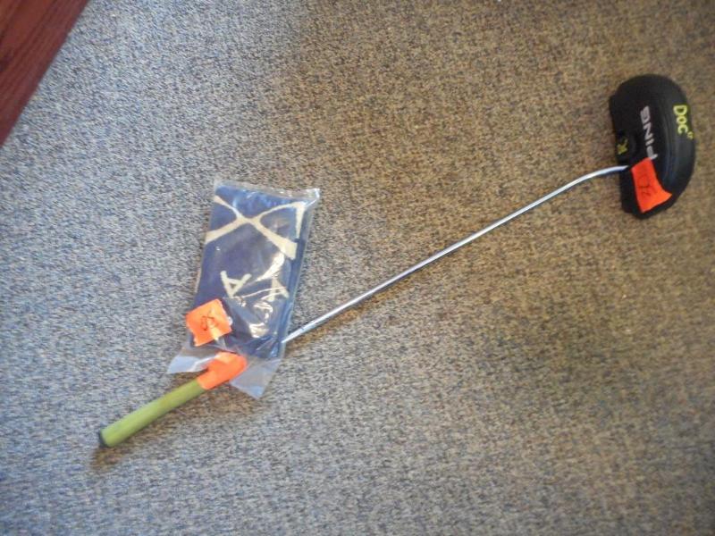 Putter and towel
