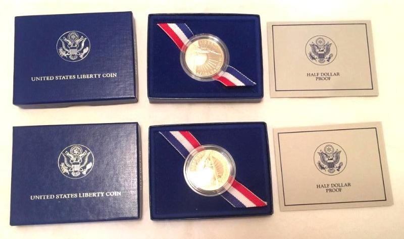 lot 41 image: 2-1986 Liberty Half Dollar Coins. These coins...