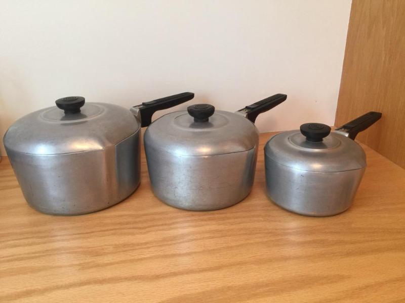 lot 74 image: 3 Wagner Ware Magnalite Sauce Pans with Lids...