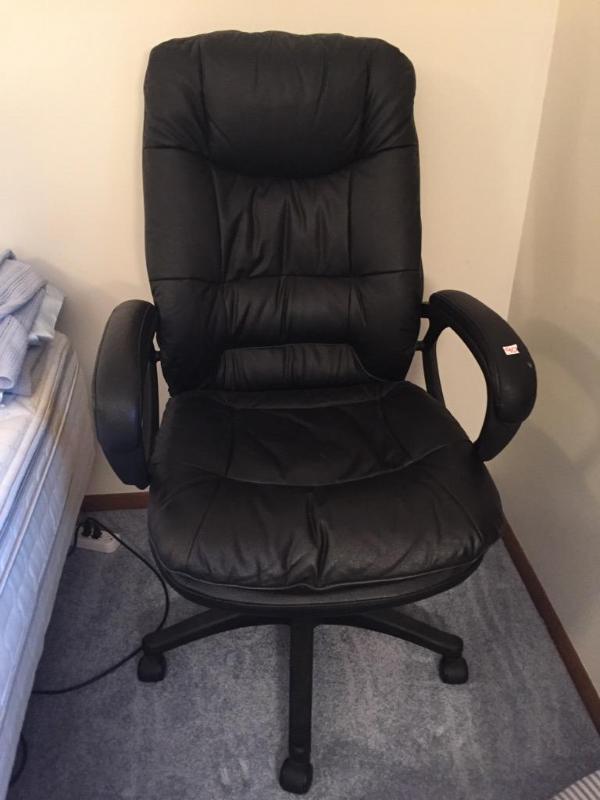 lot 90 image: Black leather rolling office chair...