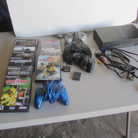 lot 260 image: Play Station 2, Controllers, Games