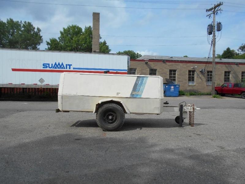 lot 5 image: Ingersoll Rand 250 Air Compressor Trailer. Runs.
