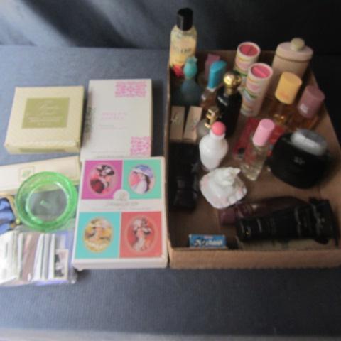 lot 39 image: Avon Bottles, Tins, Powder Mitt