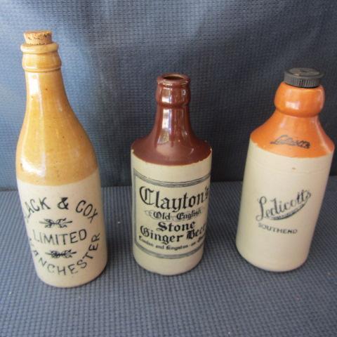lot 64 image: Crockery Beer Bottles