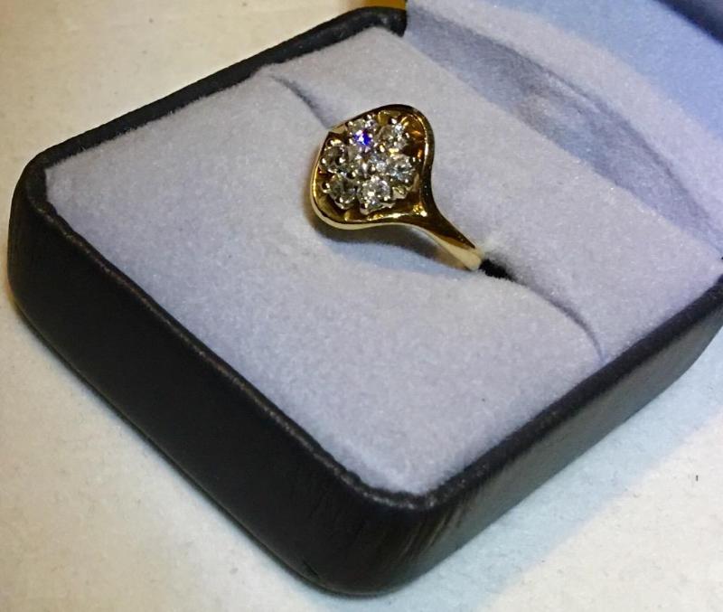 lot 102 image: 14 karat gold and diamond ring. Approximately...