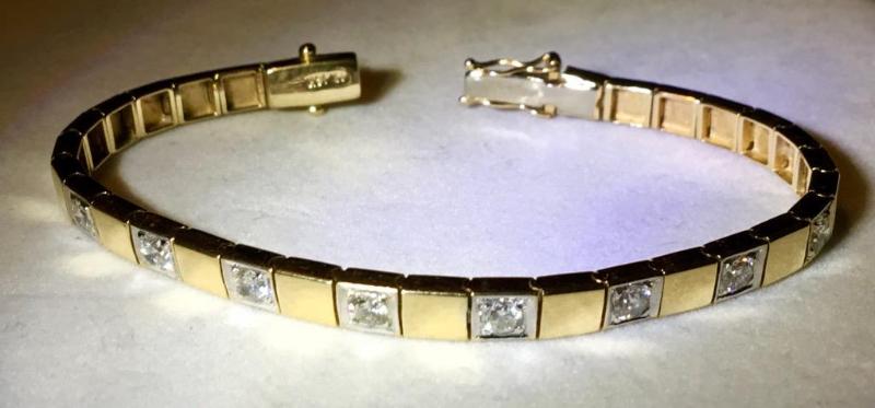 lot 103 image: 14 karat gold and diamond bracelet tested pos...
