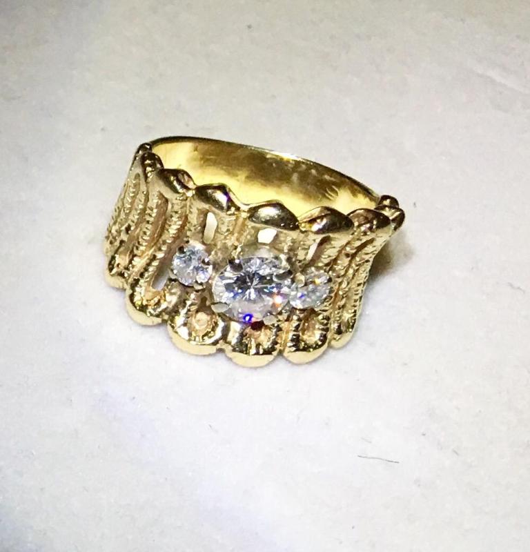 lot 105 image: 14 karat gold and diamond ring. Tested positi...