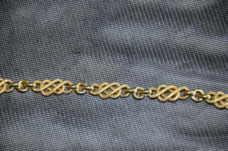lot 107 image: 14 k Gold braided bracelet ...