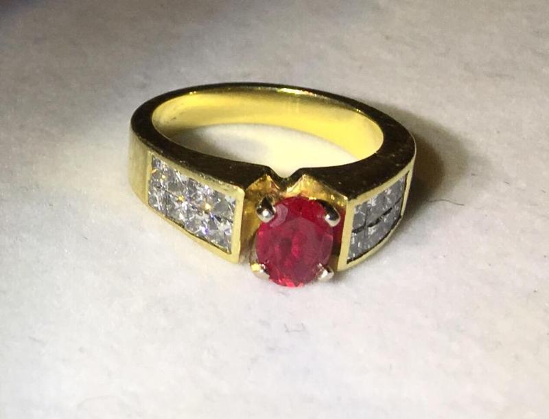 lot 108 image: 10 karat gold diamond ring with large red Rub...