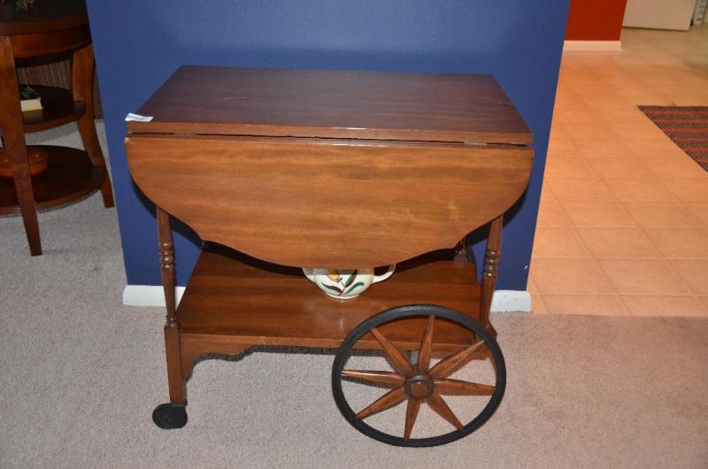 lot 135 image: Drop leaf wood table 27x37x27" high...