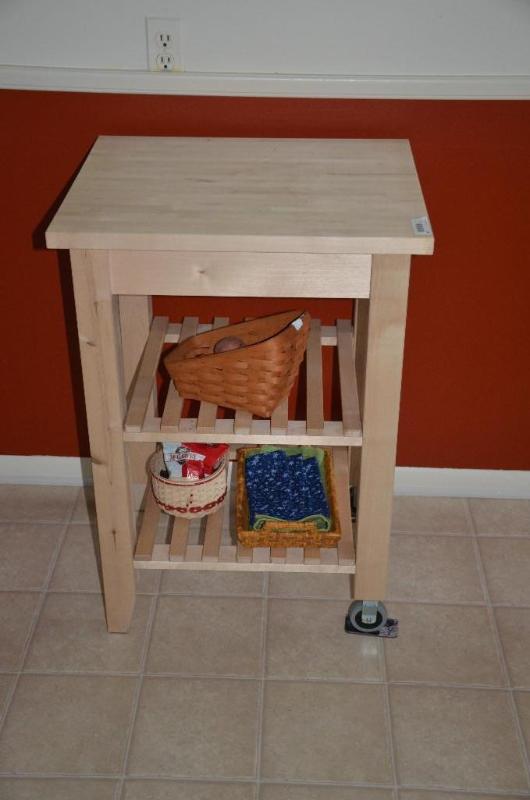 lot 164 image: Wood table 20x24x34" high.  Ikea...