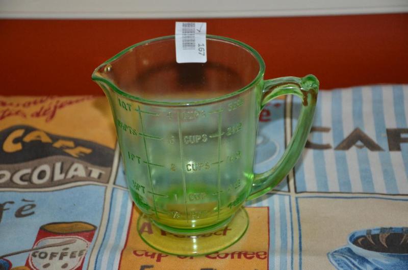 lot 167 image: Vaseline Glass&nbspfour cup green glass meas...