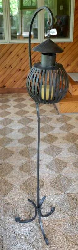 lot 174 image: Metal Floor candle holder  50" tall...