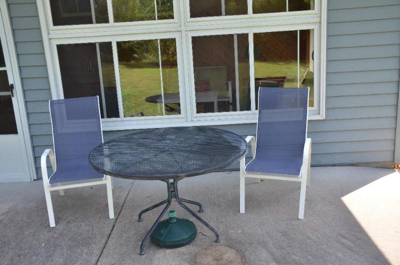 lot 176 image: Metal Patio table 48" diameter & 2ch...
