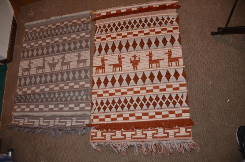 lot 142 image: 2 Hand woven in Ecuador wall hangings 50x32&q...