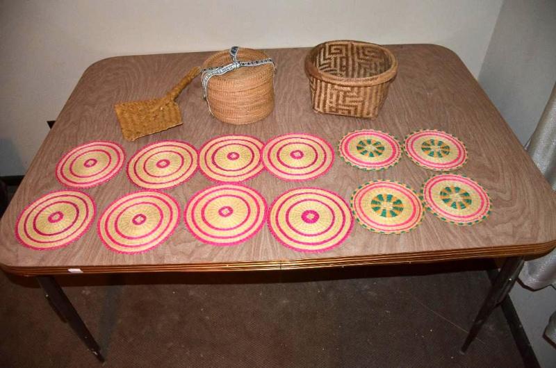 lot 149 image: Made in Ecuador hand woven baskets and placem...