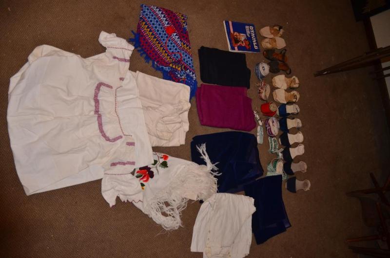 lot 154 image: Clothing from Ecuador - shoes, shirts, skirts...